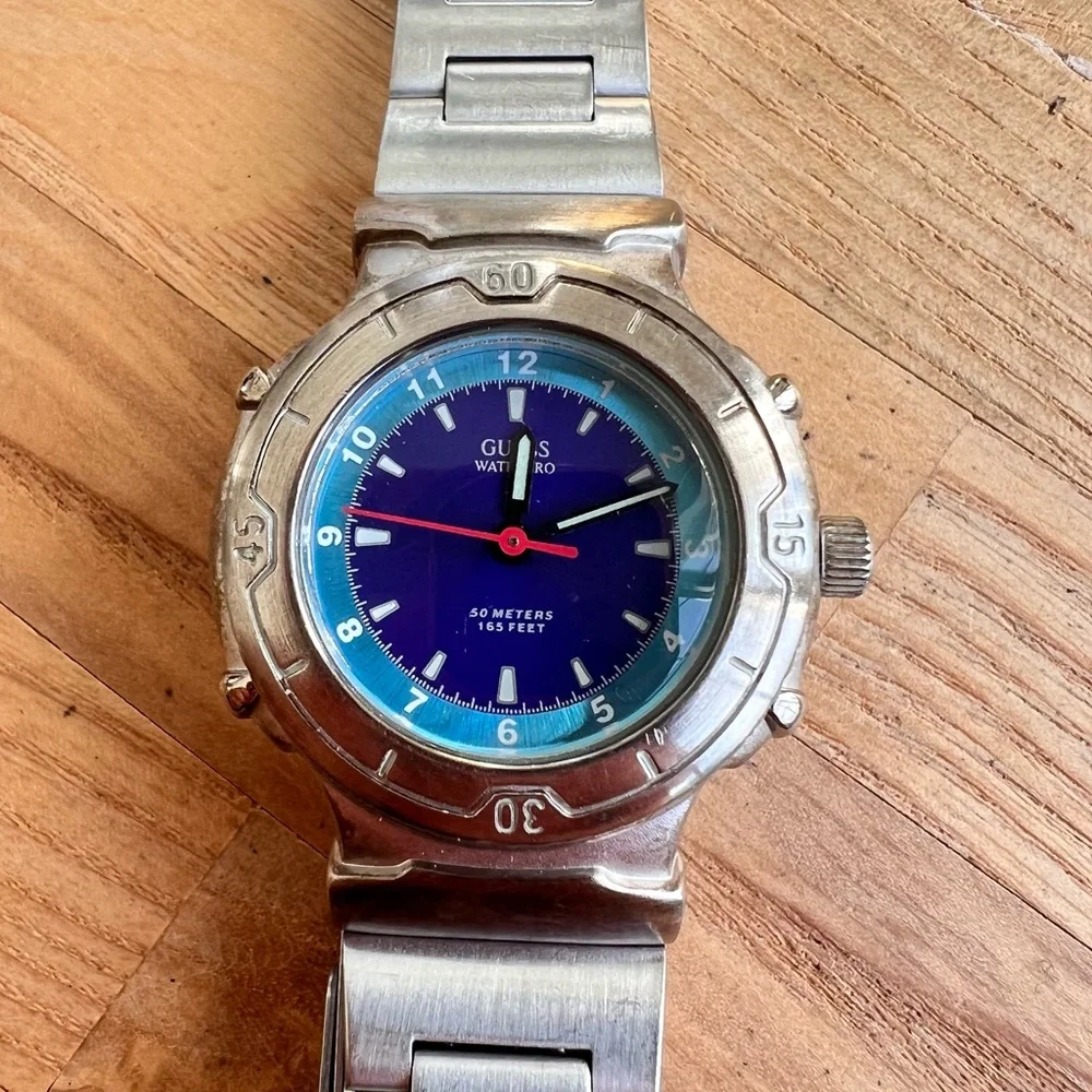 Guess ladies waterpro blue dial silver tone sport watch NEW BATTERY